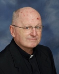 Reverend Monsignor John A.  Close
